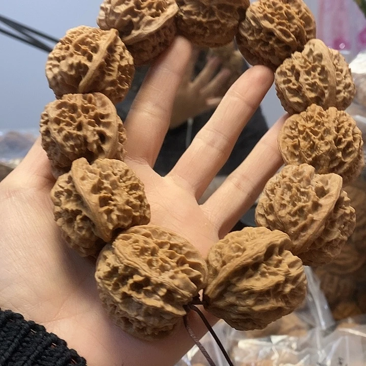 文玩核桃把件38野牛手持