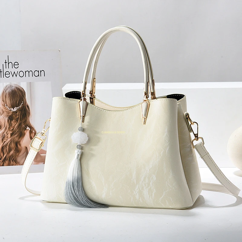 母亲节送妈妈2025新款时尚手提包白色大容量中年女士斜挎包潮