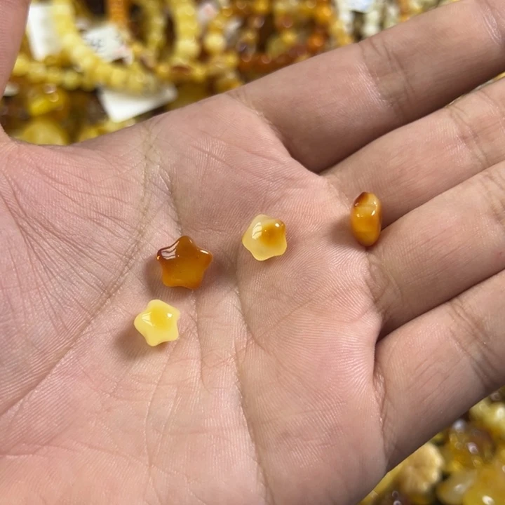 我****琥珀未镶嵌裸石蜜蜡星星1.27g