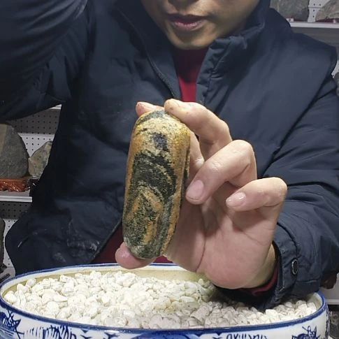 石材手把件。天然葫芦雕刻