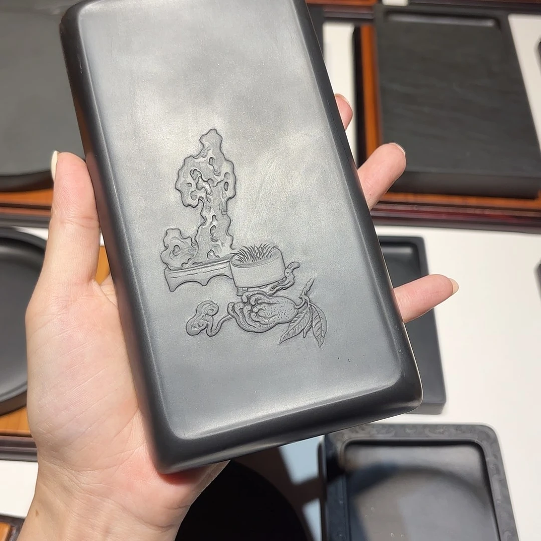 阿****歙砚金星坑黑龙尾