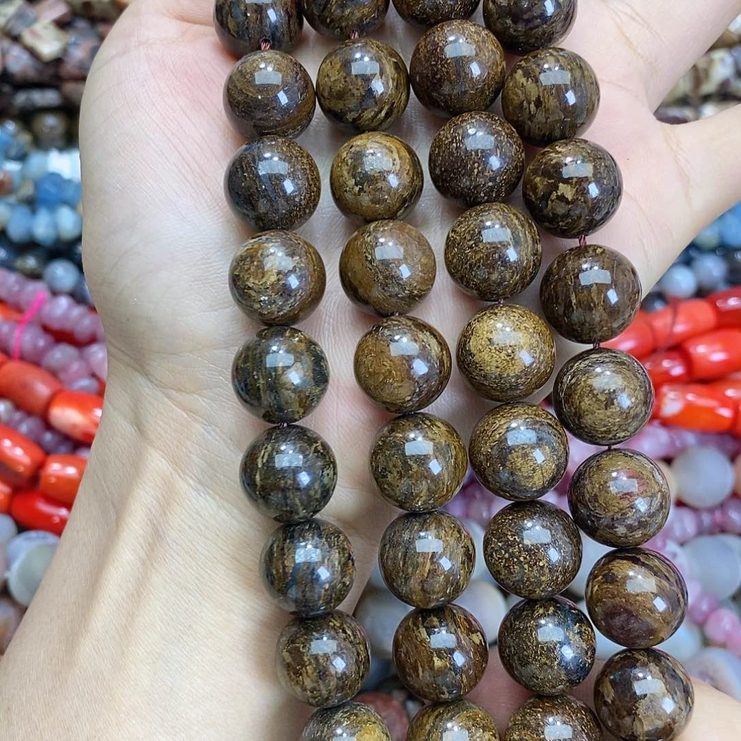 玛瑙/玉髓未镶嵌珠宝半成品古铜辉圆珠随机一条装散珠