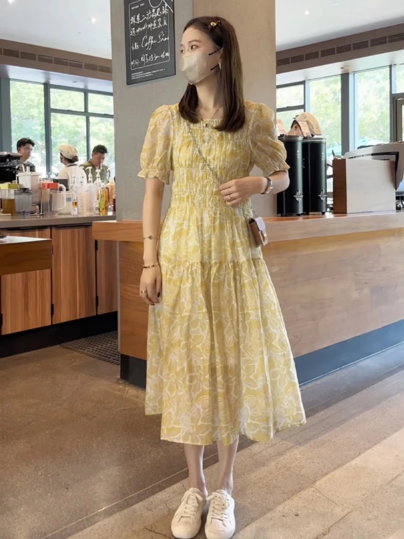 法式时尚泡泡袖黄色碎花连衣裙女2025夏季新款气质打揽显瘦中长裙