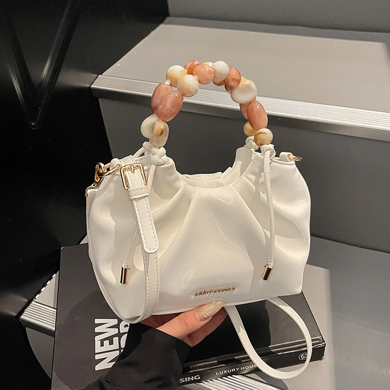 艾米兔 X COOLE女包2025新款时尚潮流百搭手提包简约日常斜挎包