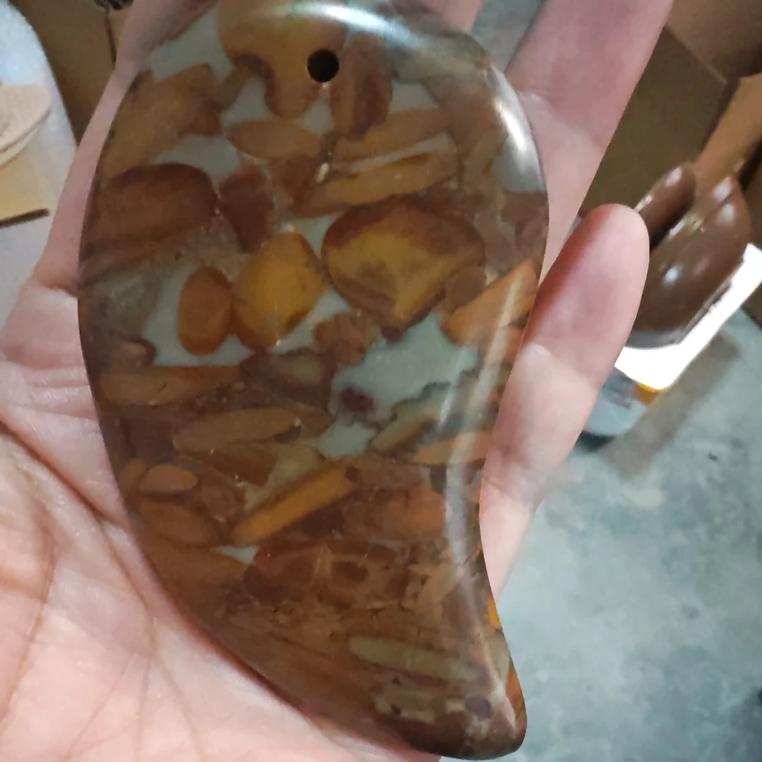 泗水砭石文化馆女娲石太极板手把件