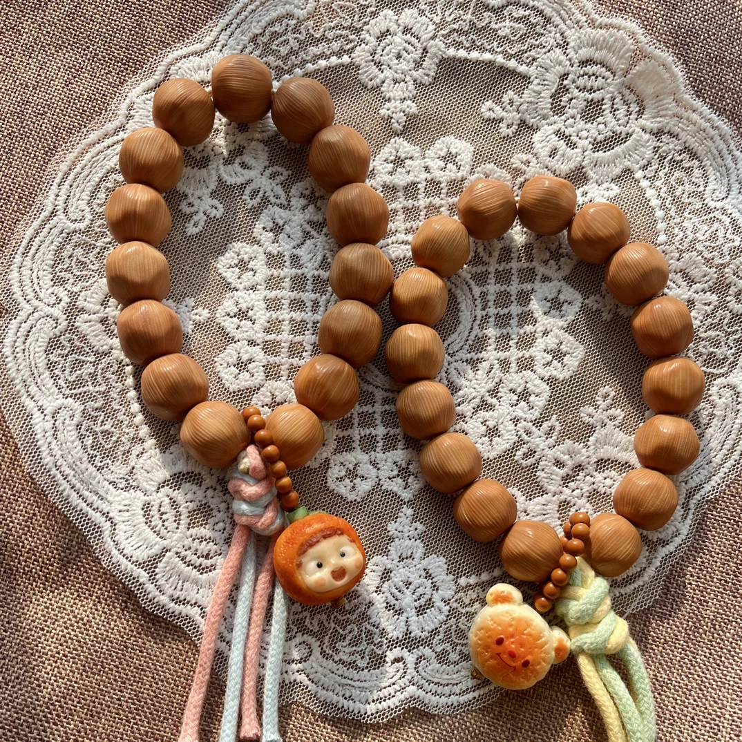 新品天然猴头拉丝奶酪球可爱配饰文玩盘玩手持易变色