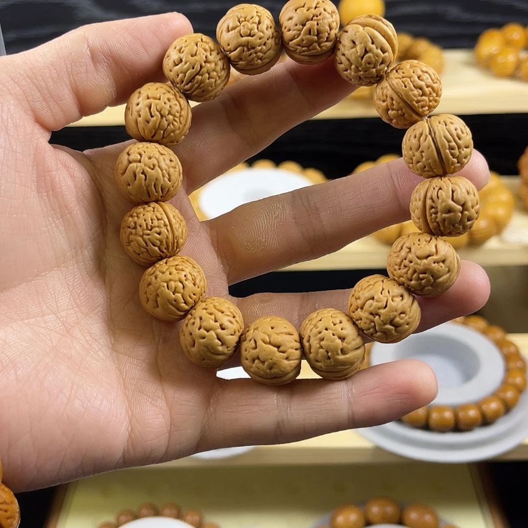 出***包桃核吊坠盘锦肌肉原皮