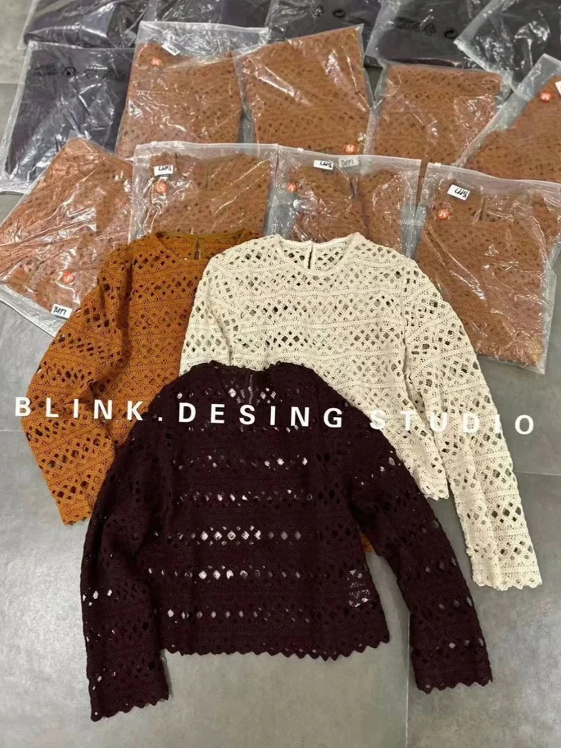 重工钩花针镂空长袖针织衫