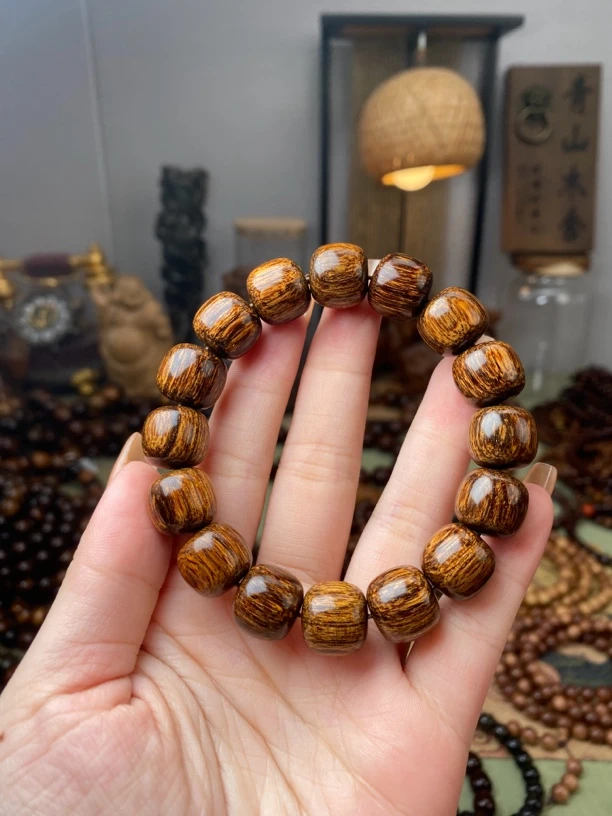 （黑金妖孽）巴布亚贡木妖孽纹理13×14mm手串