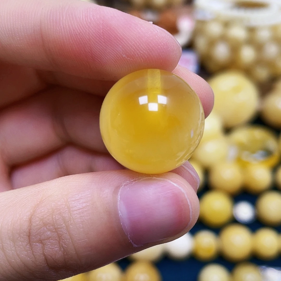 蜜蜡未镶嵌裸石18.8mm.瑕