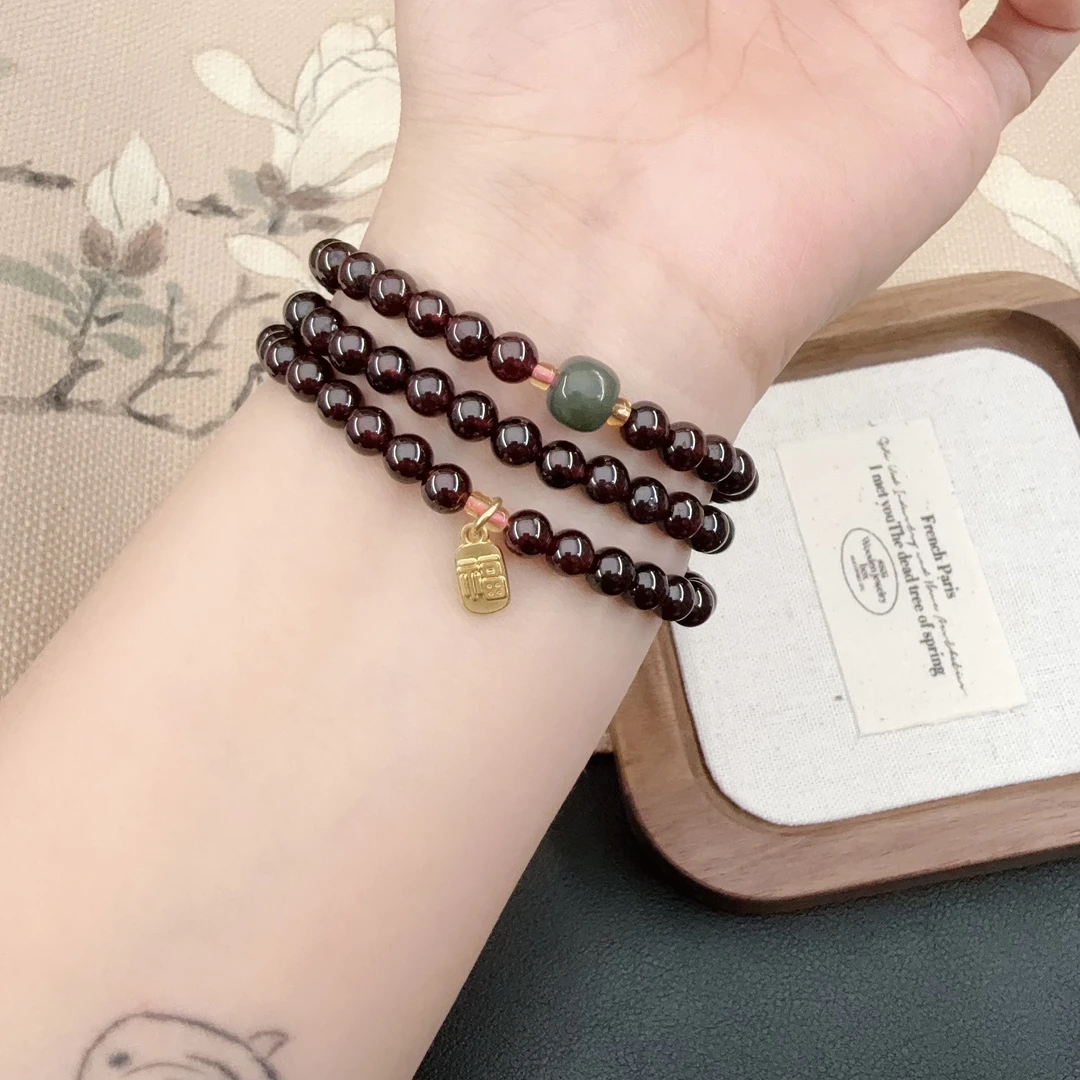 【9A级】6mm天然石榴石三圈和田玉转转珠手串