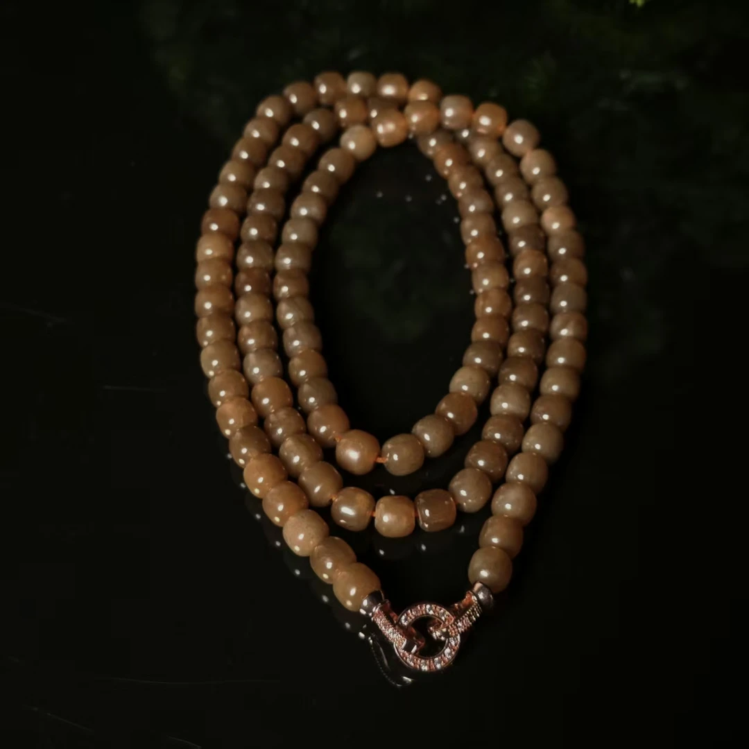 lot6641 项链 和田玉糖玉 7*6.5mm*108颗 54.8g