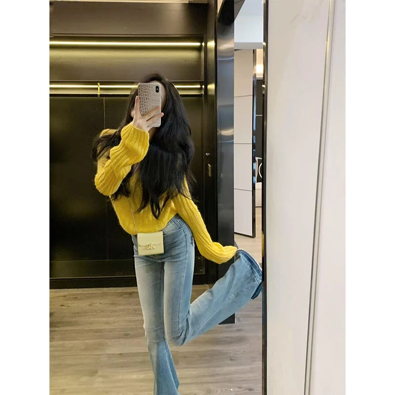 秋季轻熟风时尚洋气套装设计感露背针织长袖上衣高腰修身牛仔裤女