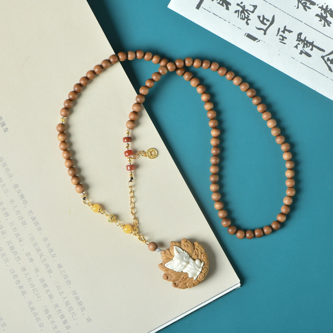 （木带宝）印度老山檀香0.5脖挂精雕镶嵌凤九款