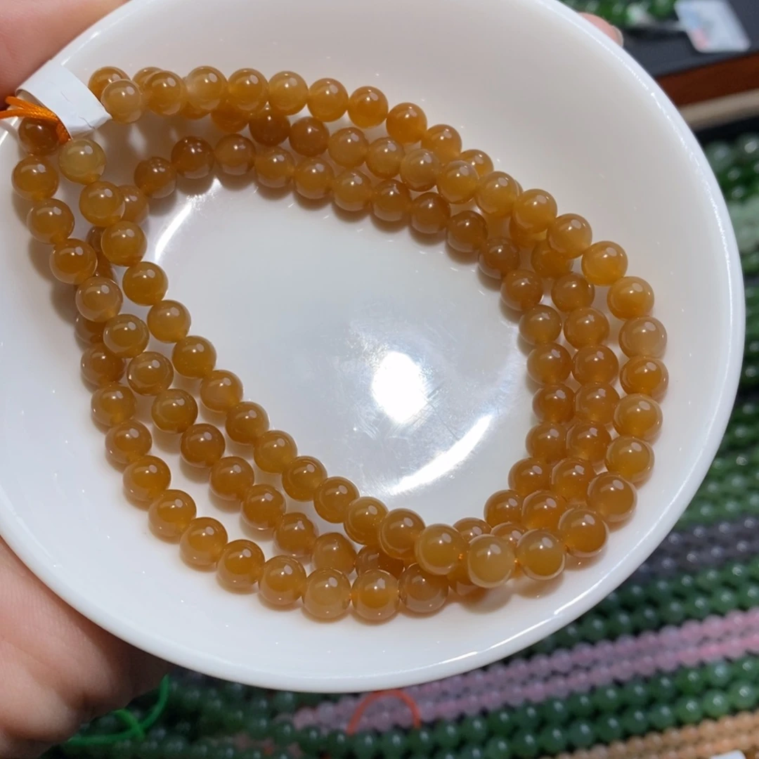 和田玉（糖玉）未镶嵌颈饰和田冰黄金糖卡6。  一条