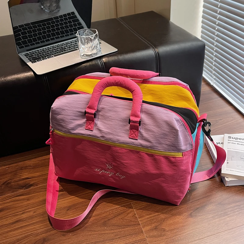 新款多巴胺撞色潮流拼色旅行包行李袋大容量耐磨时尚百搭单肩斜挎