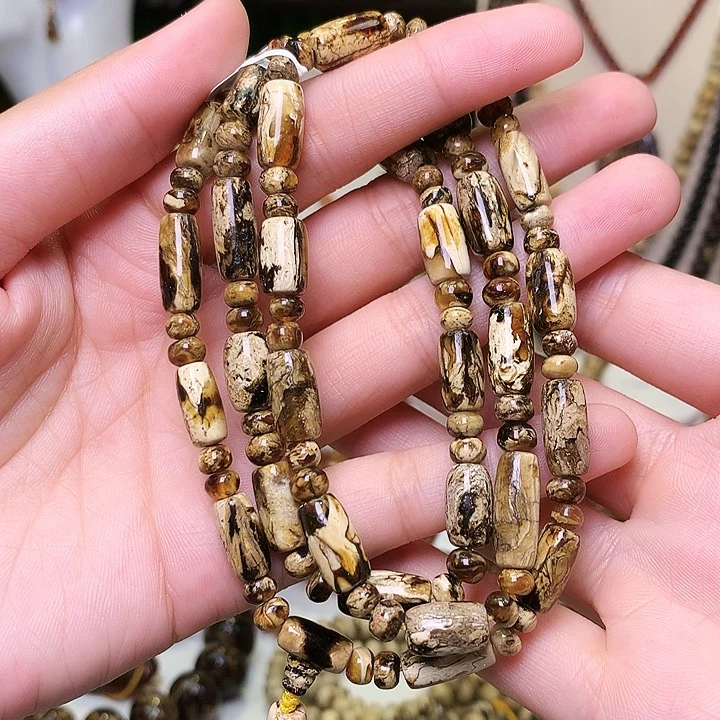 琥珀裸石未镶嵌抚顺琥珀干白花筒子珠长链