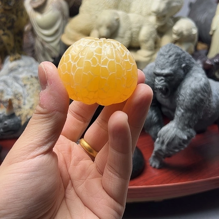 辽宁石橘子手把件