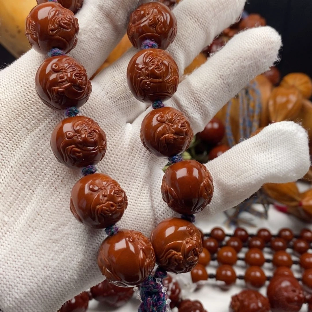 橄榄核手串熊***呢我想知道