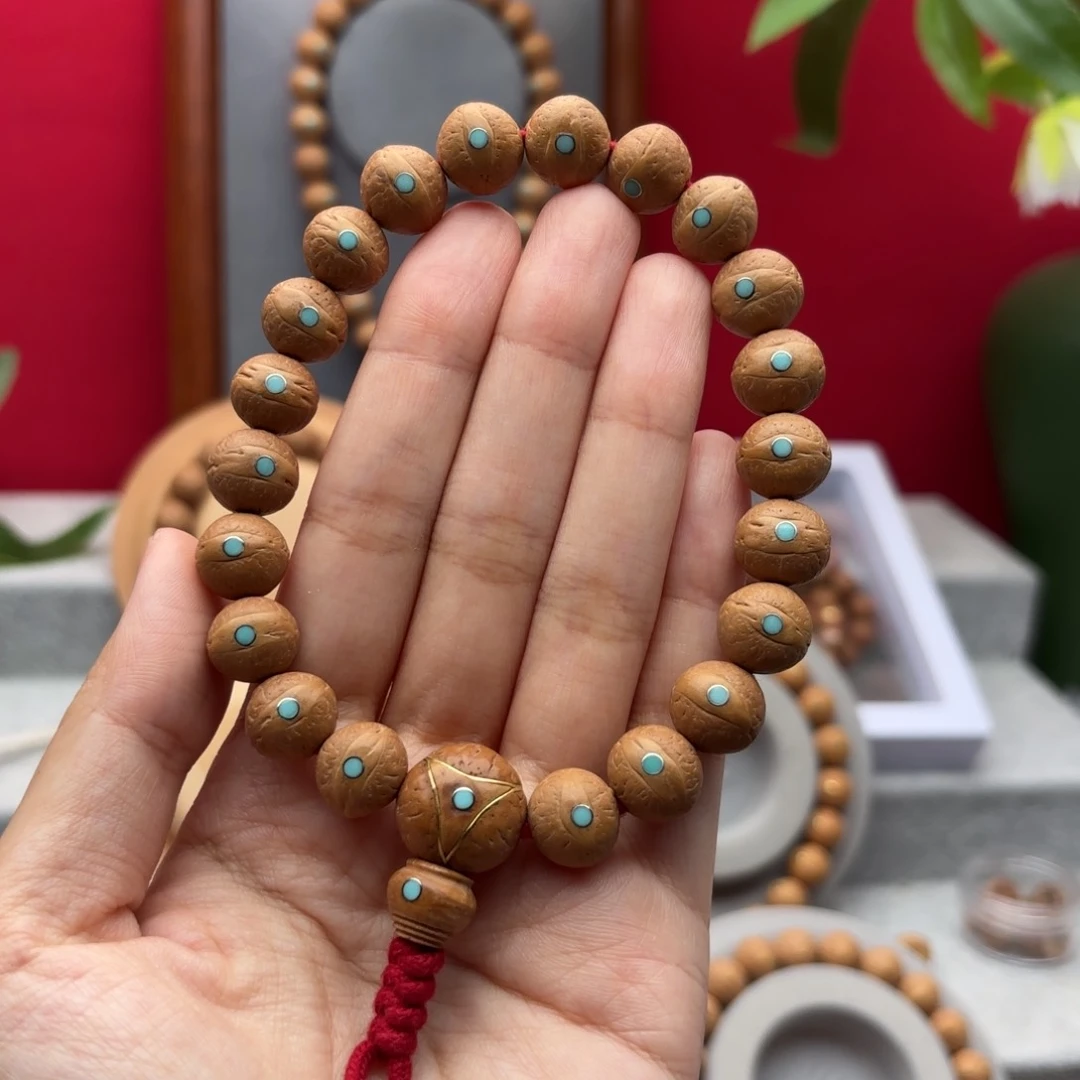 凤眼菩提手串是**吖12.3左右镶嵌手串