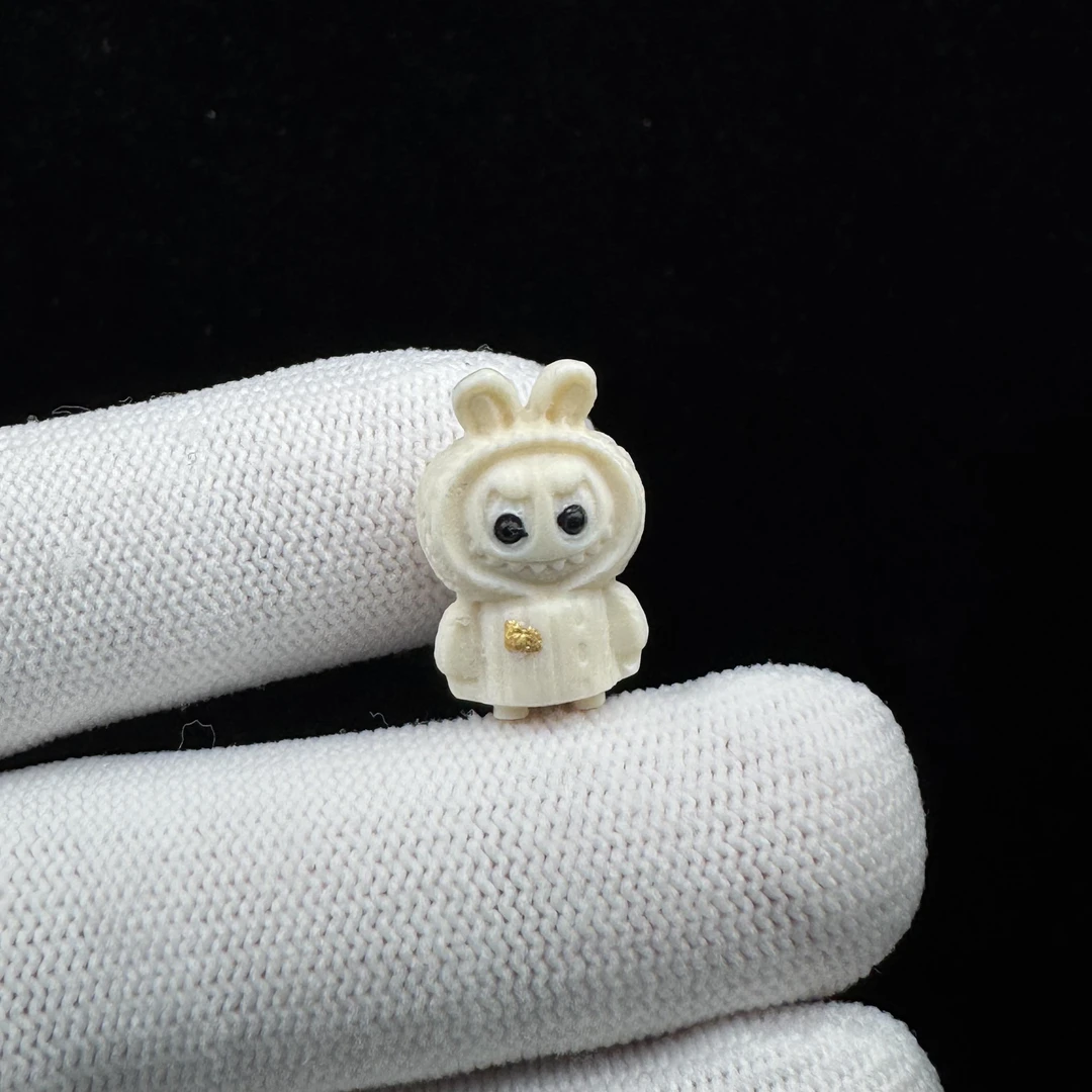 K8704天然猛犸牙 雕刻拉布布小配饰12.5*19.5mm一物一图 假一罚十