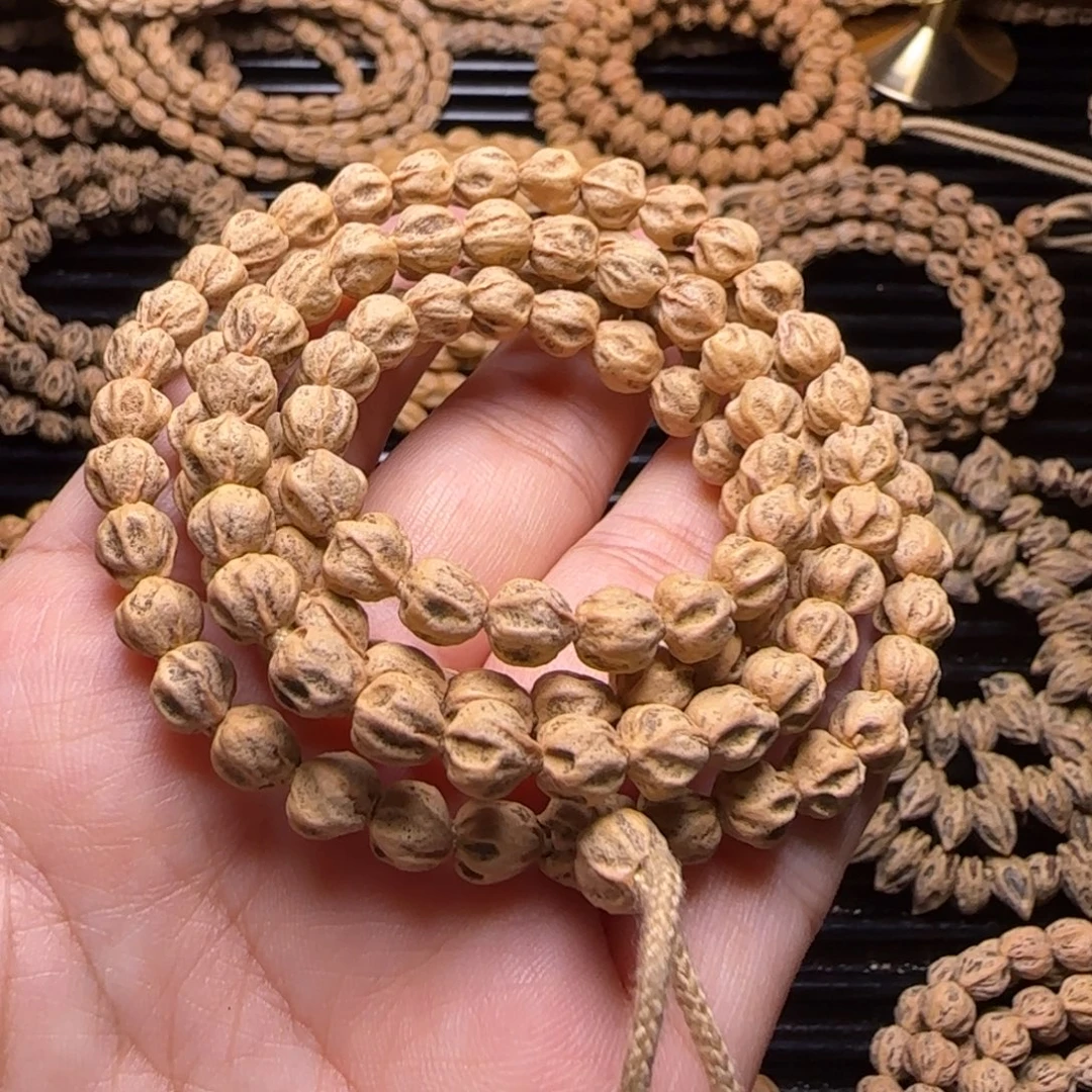 芙***水柏香籽/百香籽吊坠