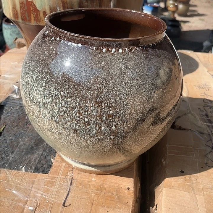 红陶口不圆口径18高度24球形