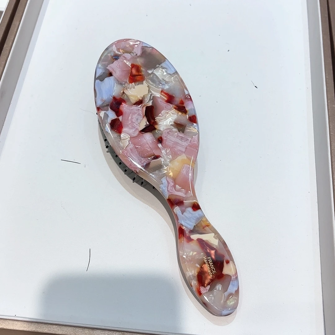 皮质铁合金鬃毛梳子