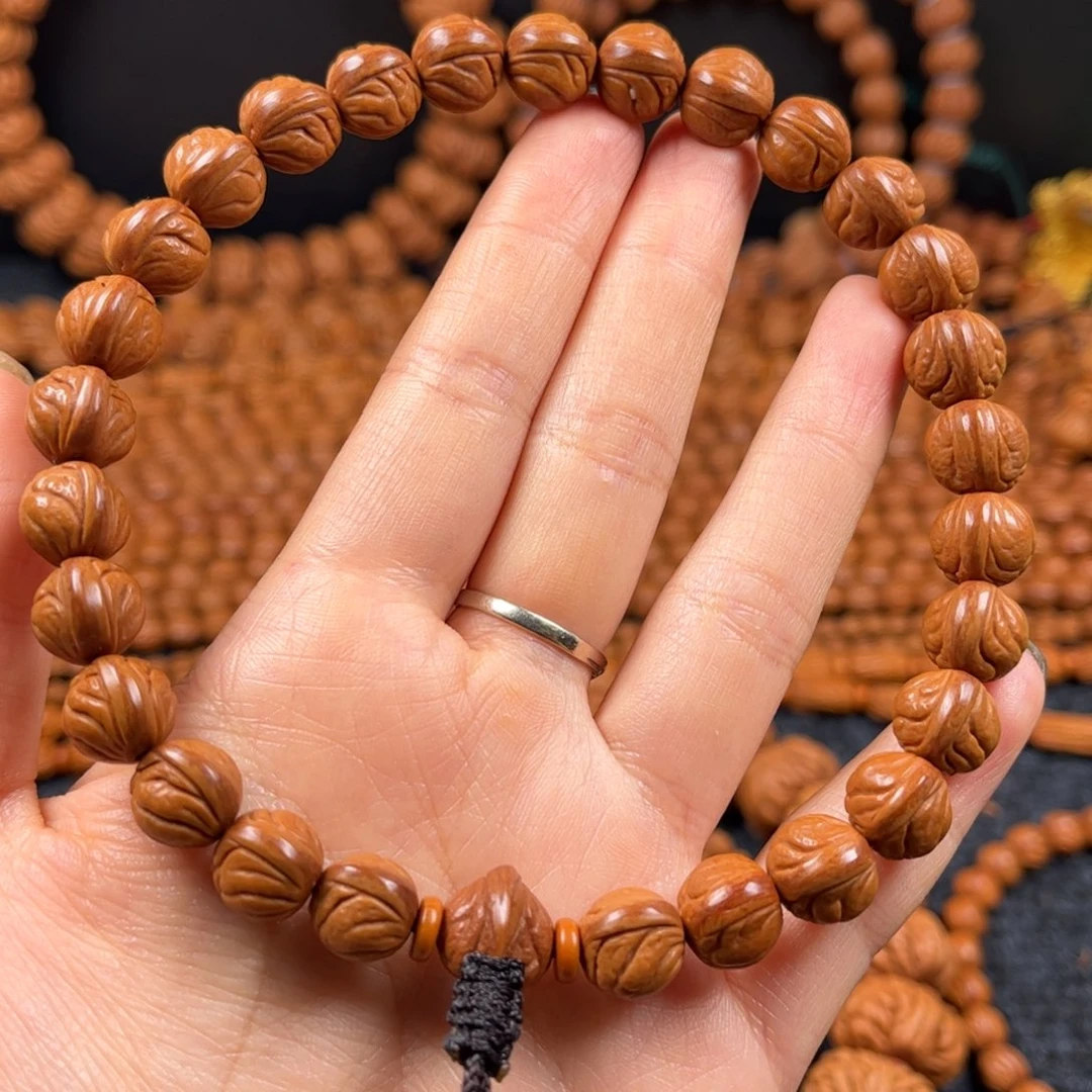 诗***泪桃核手串A6链接手串