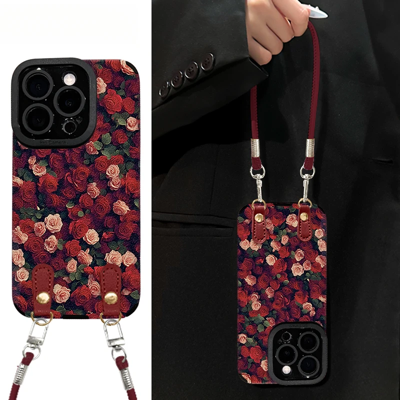 满屏红玫瑰适用苹果16瞳眼羊皮挂绳手机壳iPhone15女防摔14/13/12