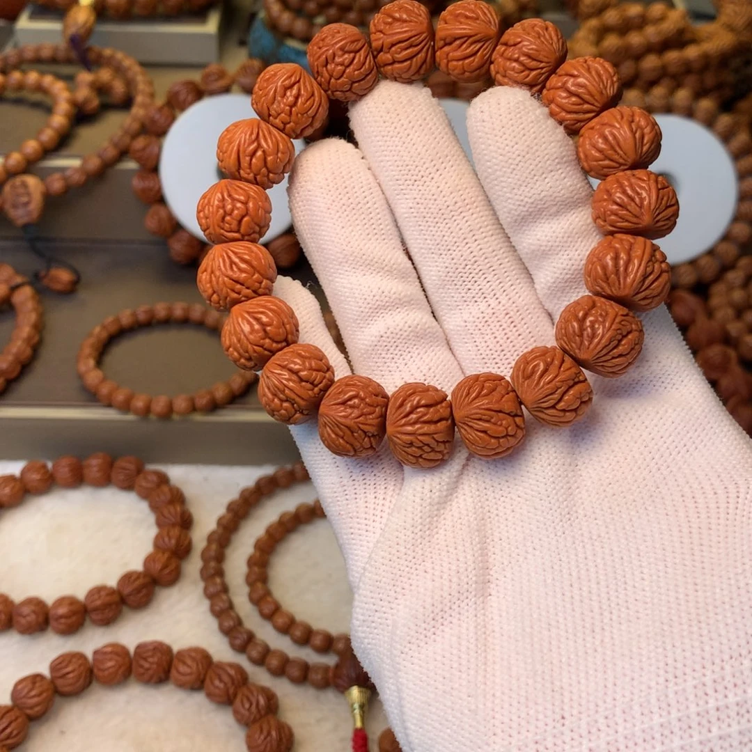 A***ò桃核手串秦岭龙纹