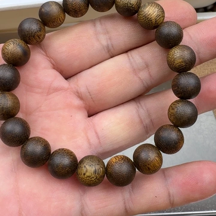 丁***喵手串沉香张勺子手串8克加