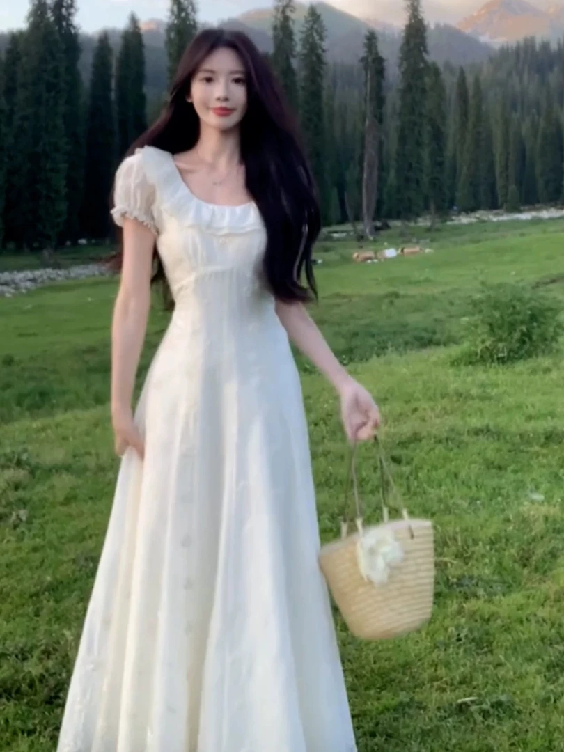 法式气质荷叶边白色连衣裙女夏季2025海边度假高级感收腰长裙4494