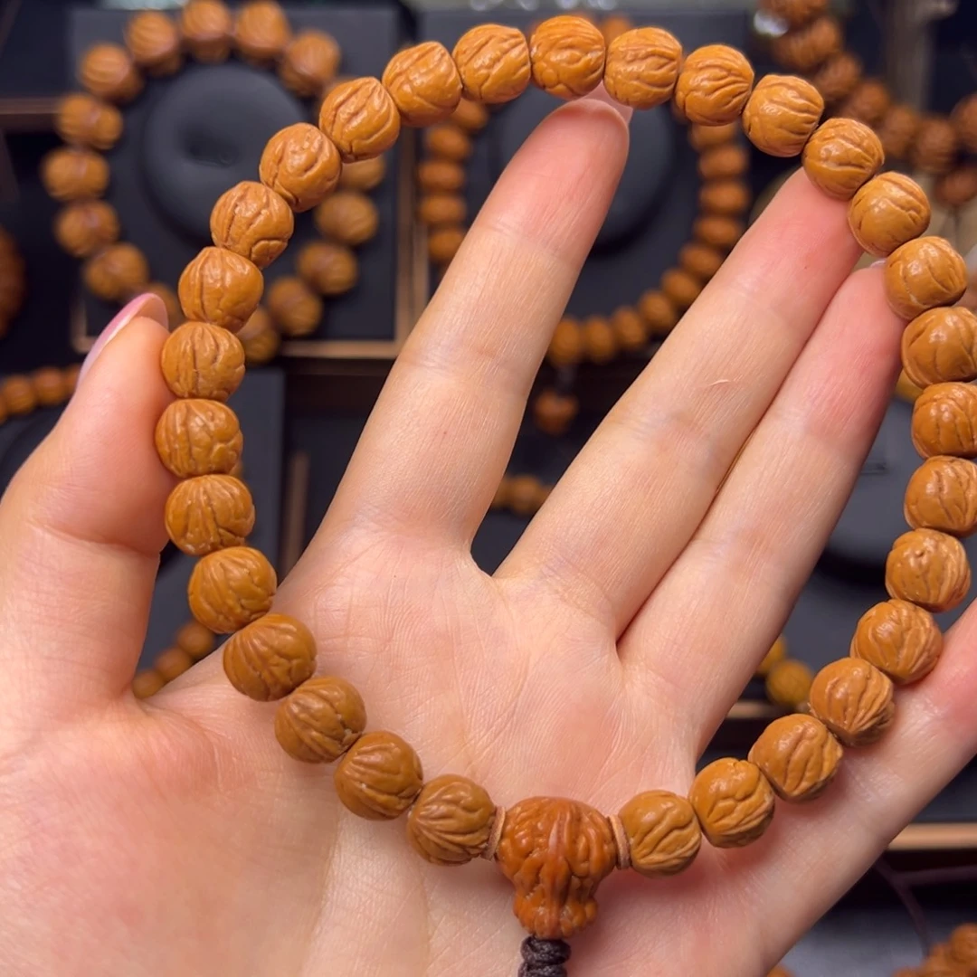 岁***心手串桃核野生玉龙脊10