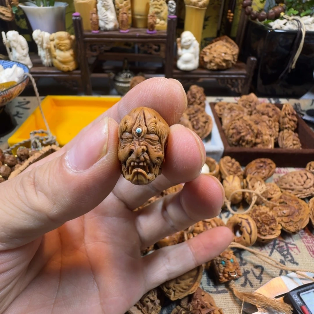 快*。桃核雕刻罗汉头一个