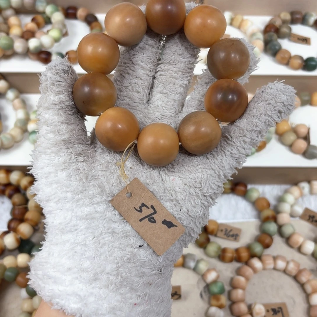 菩提根/象牙果吊坠570卡 24.5苹果福利瑕疵