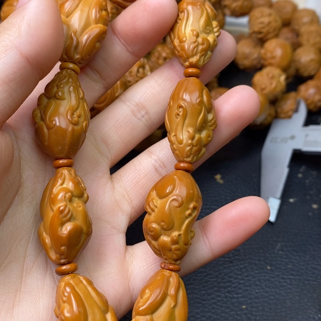 橄榄核手串汉***队橄榄核貔貅