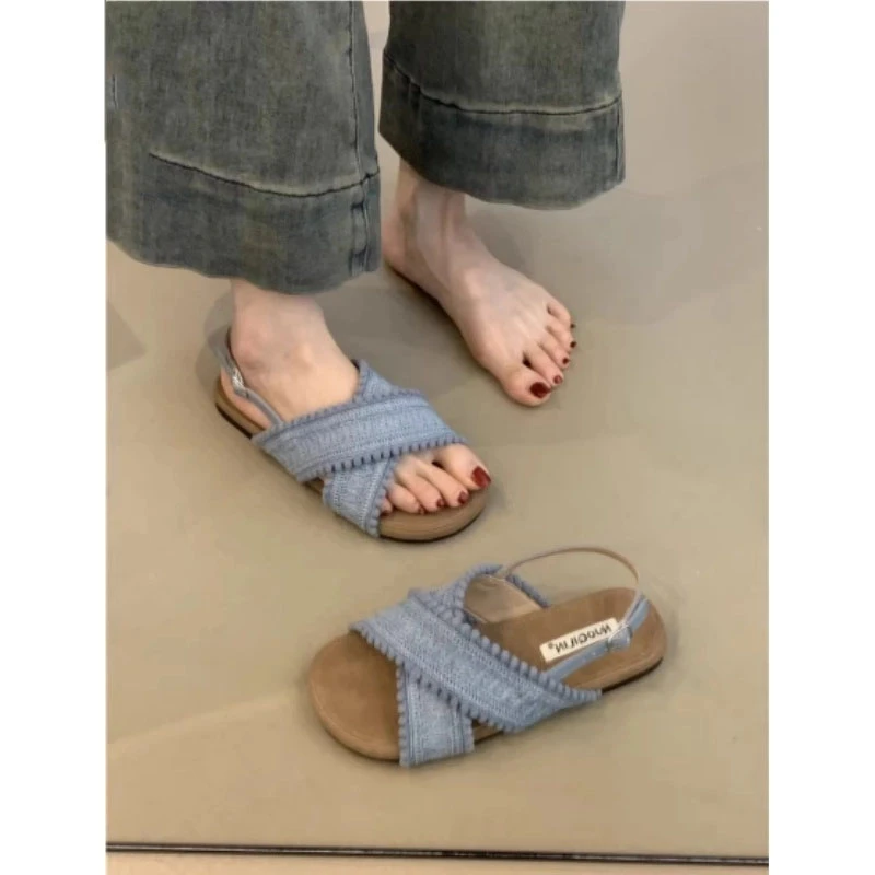 法式编织交叉带平底罗马凉鞋女夏季新款一字扣带度假风沙滩凉拖鞋