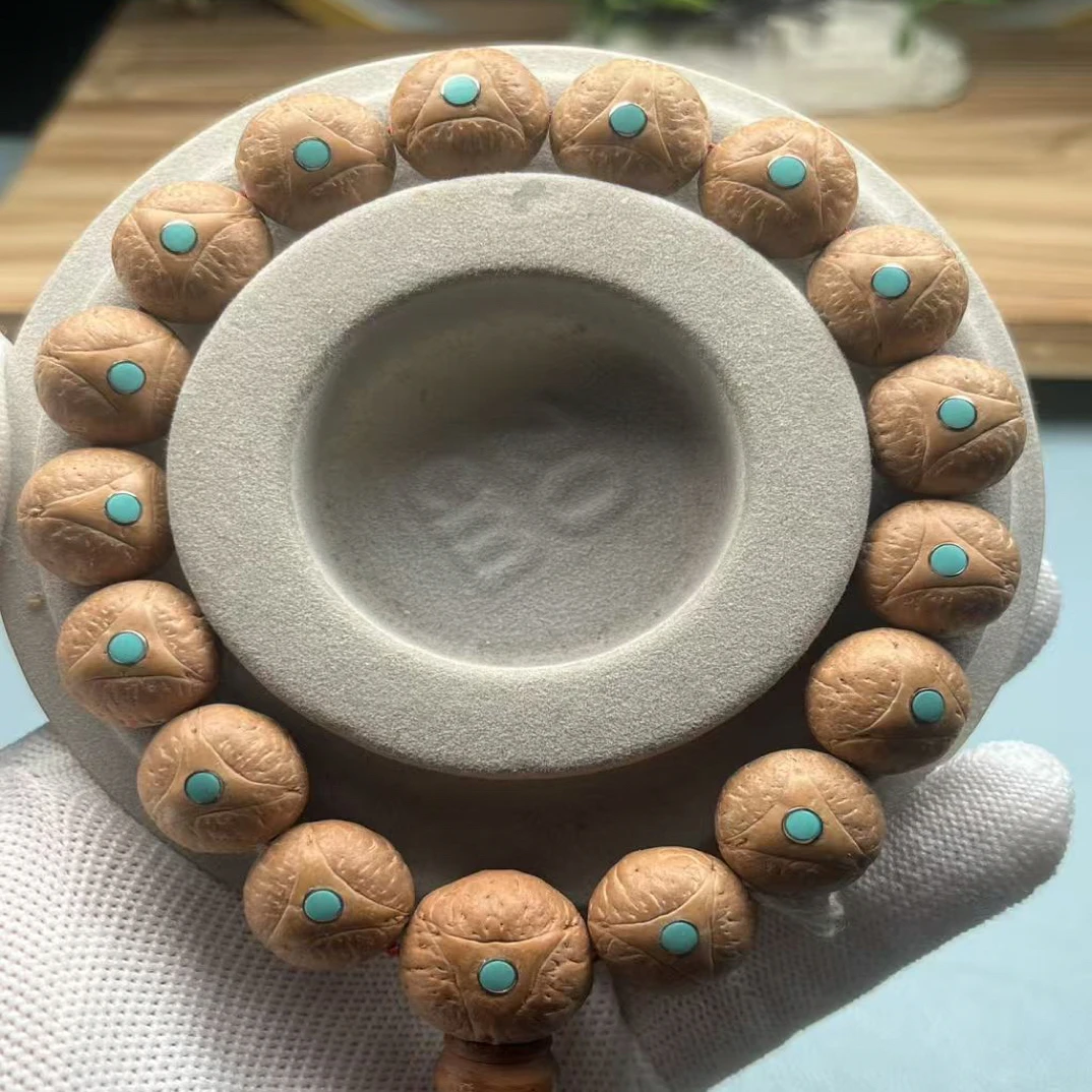 尼泊尔龙眼菩提手串(货头尺寸15mm升级版精工镶嵌蓝彩钉)