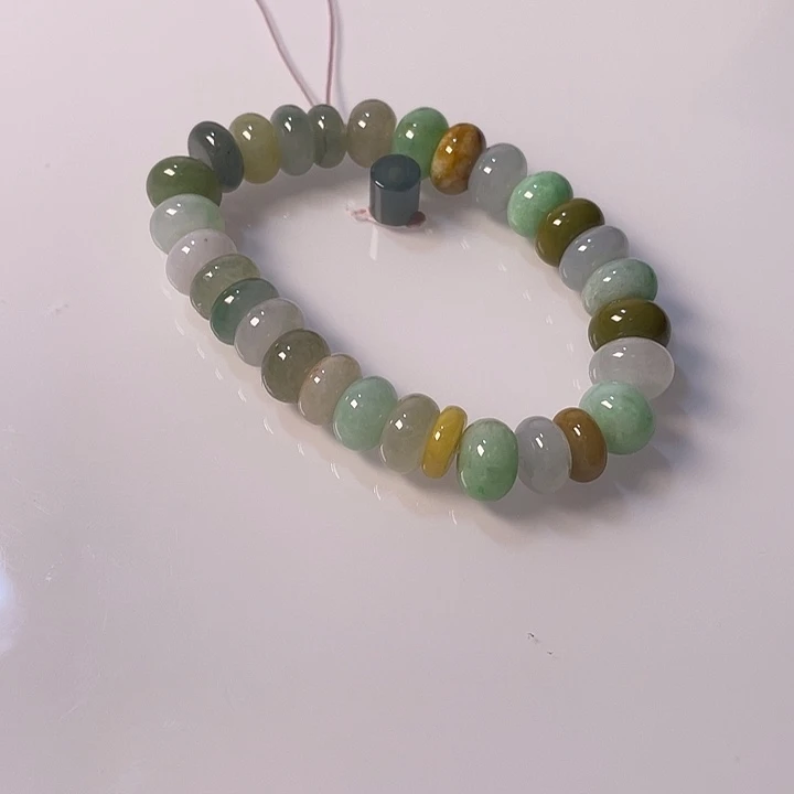 茹***。翡翠散珠A货多宝手串