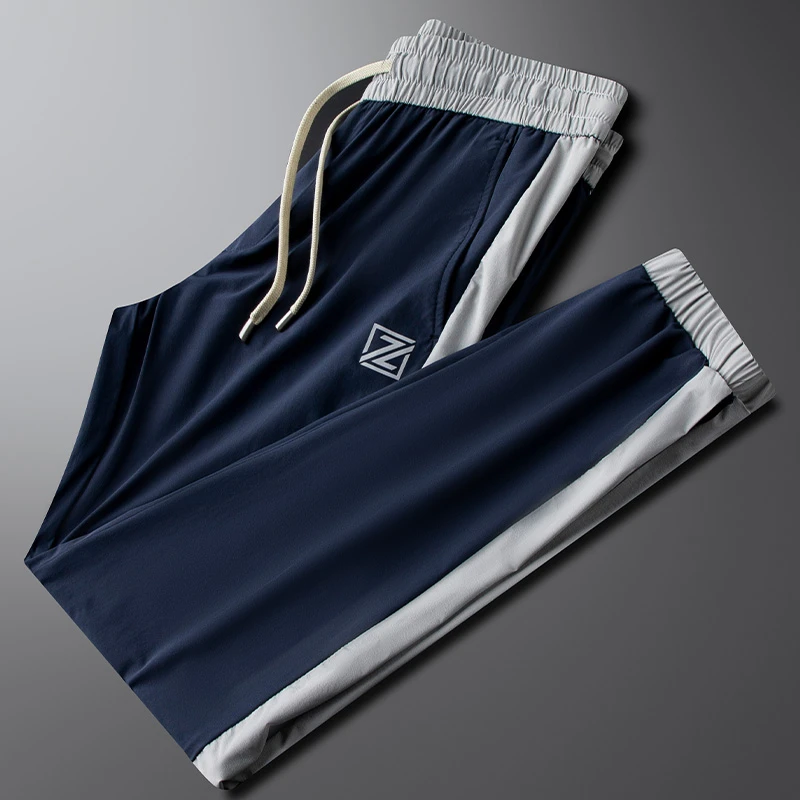 高端夏季冰丝蓝色休闲裤男款修身束脚撞色速干小脚弹力运动裤卫裤