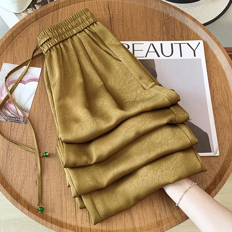 拉夏贝尔高级感香槟色缎面阔腿裤女夏季2025新款醋酸印花直筒裤子