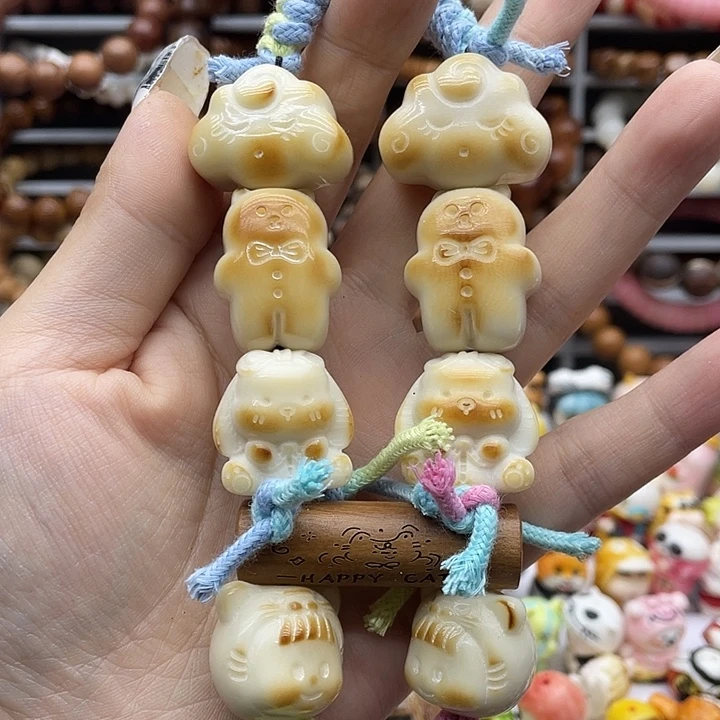 非金属牙果配饰手持