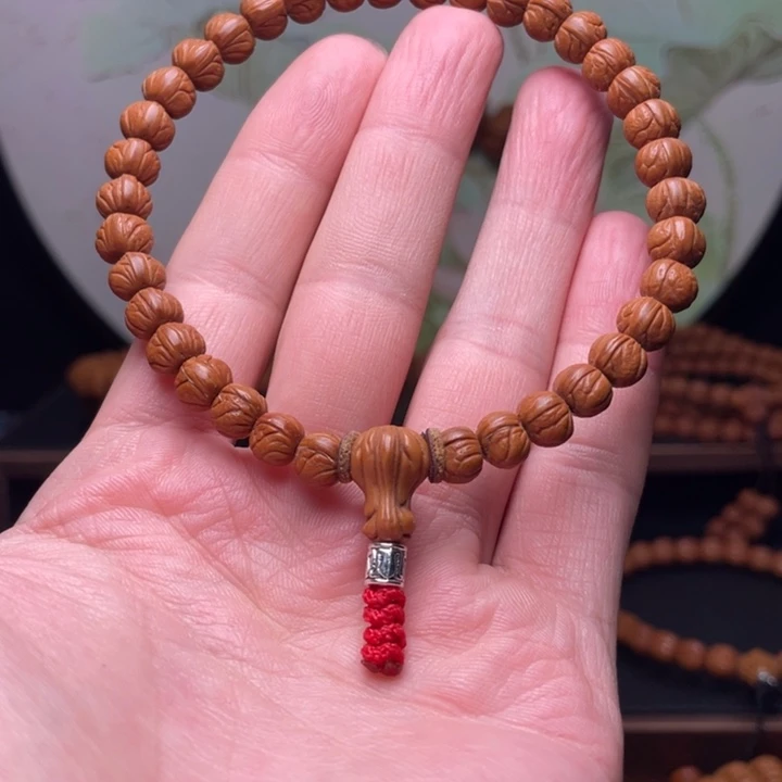 用***0桃核手串0.8玉龙脊手持