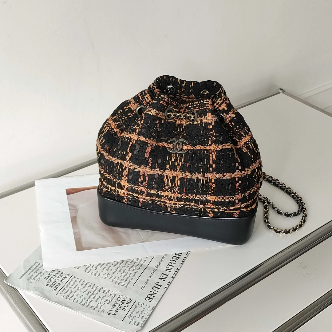 95新 Chanel/香奈儿 Azul-黑拼橘毛呢流浪小号双肩包/39815