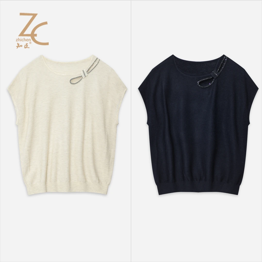 知臣秋季新品 简约带钻领口蝴蝶结镂空短袖针织衫女 T25653051