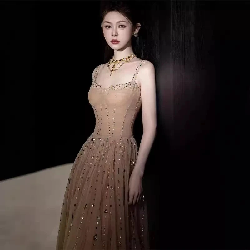 香槟色晚礼服女轻奢小众高端宴会名媛气质主持人吊带长裙高级质感