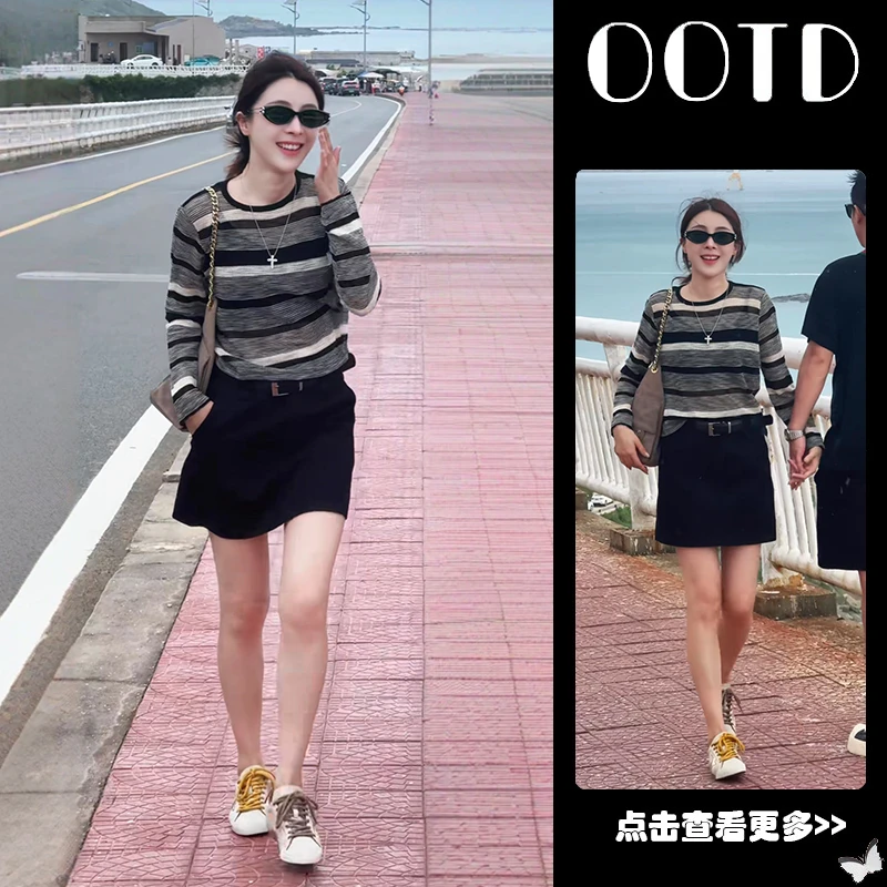 早秋薄款穿搭一整套女2025新款韩版宽松条纹针织衫百搭短裙两件套