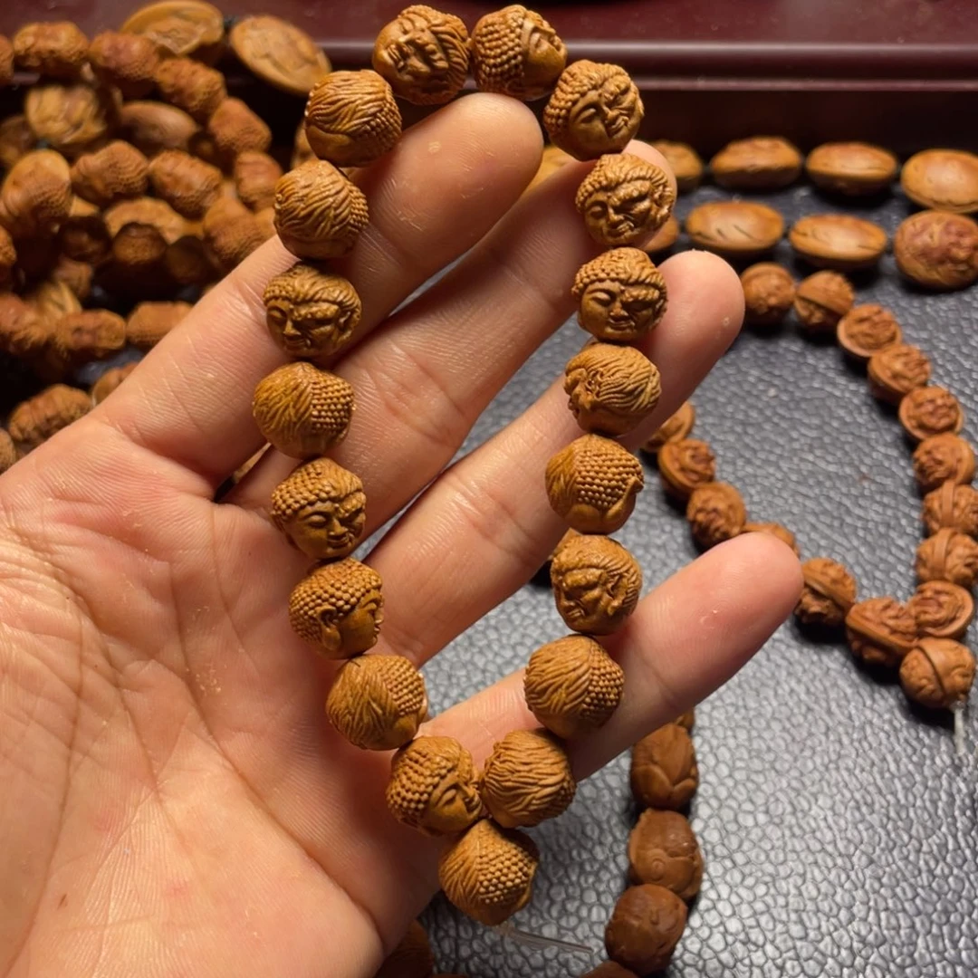 龙纹桃核雕刻佛魔一念