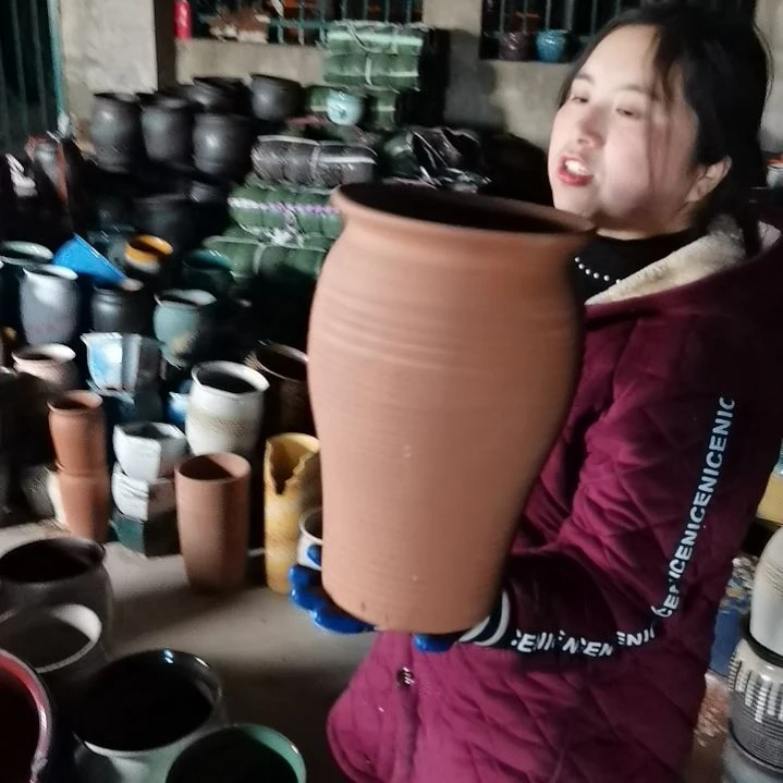 红陶口20高33瑕疵